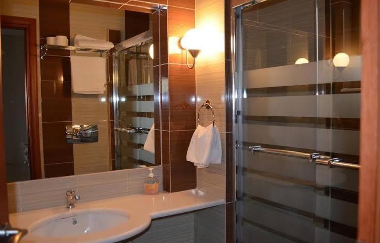 Evia Hotel & Suites Marmari  Стая снимка
