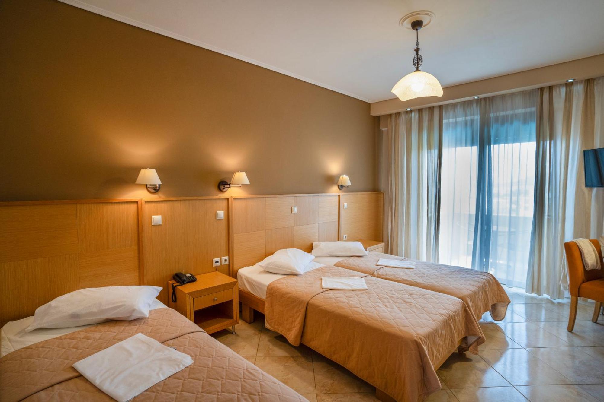 Evia Hotel & Suites Marmari  Екстериор снимка
